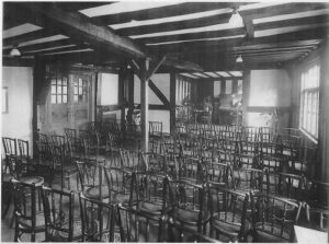 Tudor House Tudor Room with chairs set out for a meeting.